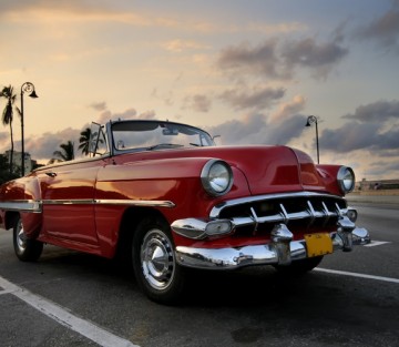 Red car in Havana sunset