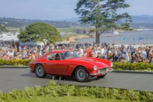 Red ferrari winning award at Pebble Beach Concours d'Elegance 2023