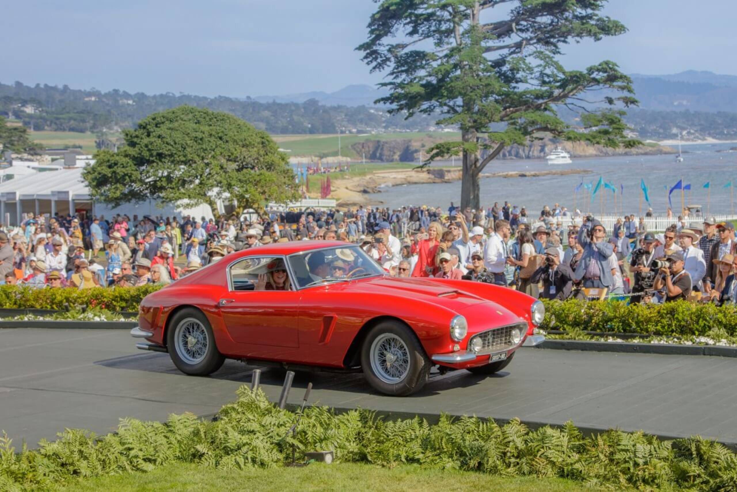 Red ferrari winning award at Pebble Beach Concours d'Elegance 2023