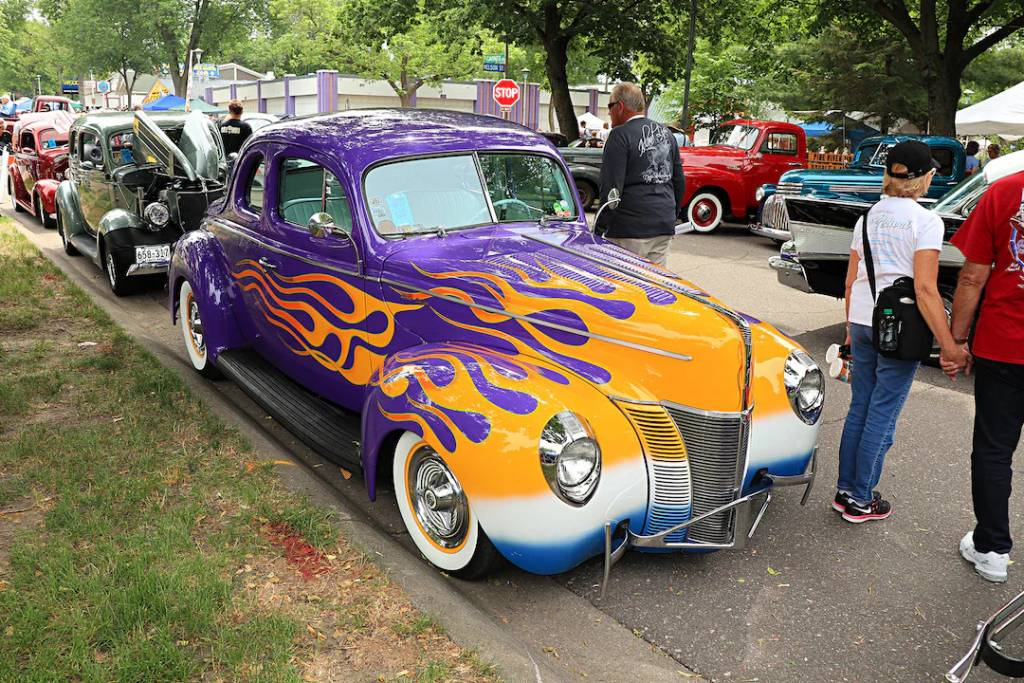 Purple classic car with flames parked at the MSRA Back to the 50s event in Minnesota