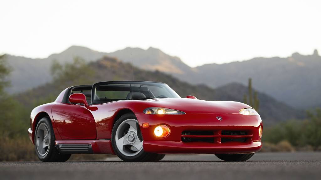 1995 Dodge Viper DR I parked in front of a mountain range