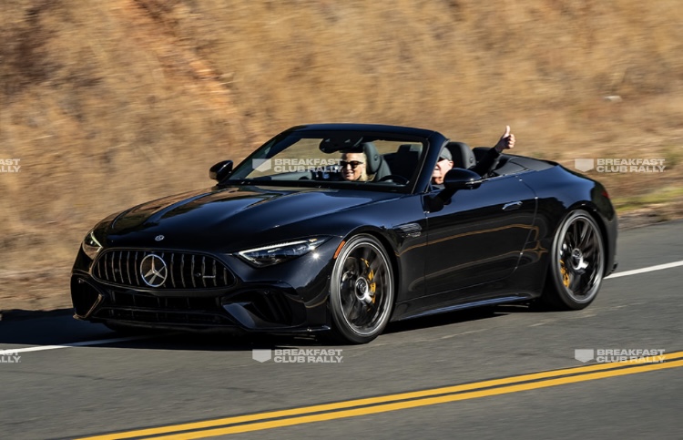 mercedes benz driving on the coast