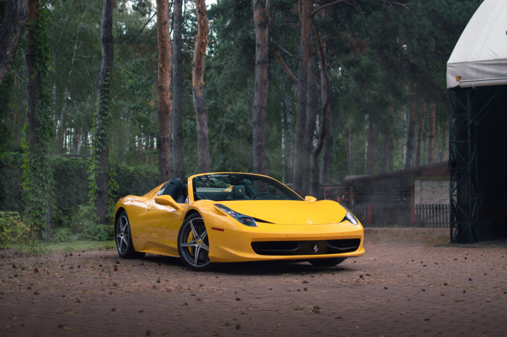 Yellow Ferrari 458 Italia in the woods