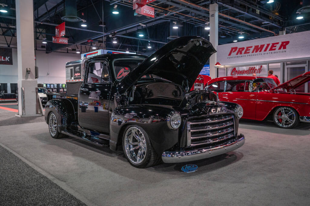 Classic GMC truck displayed in a showroom