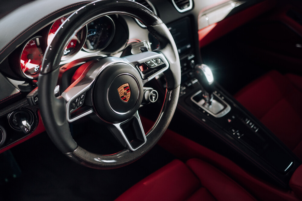 Porsche red interior and black steering wheel