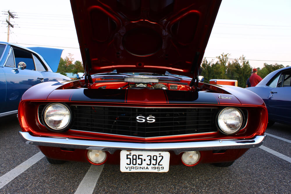 red Chevy Camaro SS with hood open