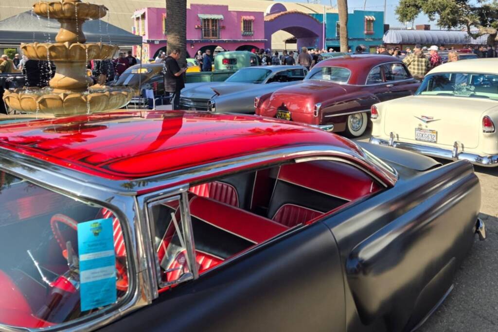 Classic cars in parking lot at Grand National Roadster Show 2025