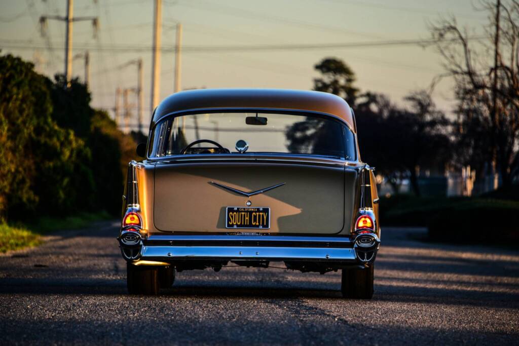 South city rod and custom classic car driving on road