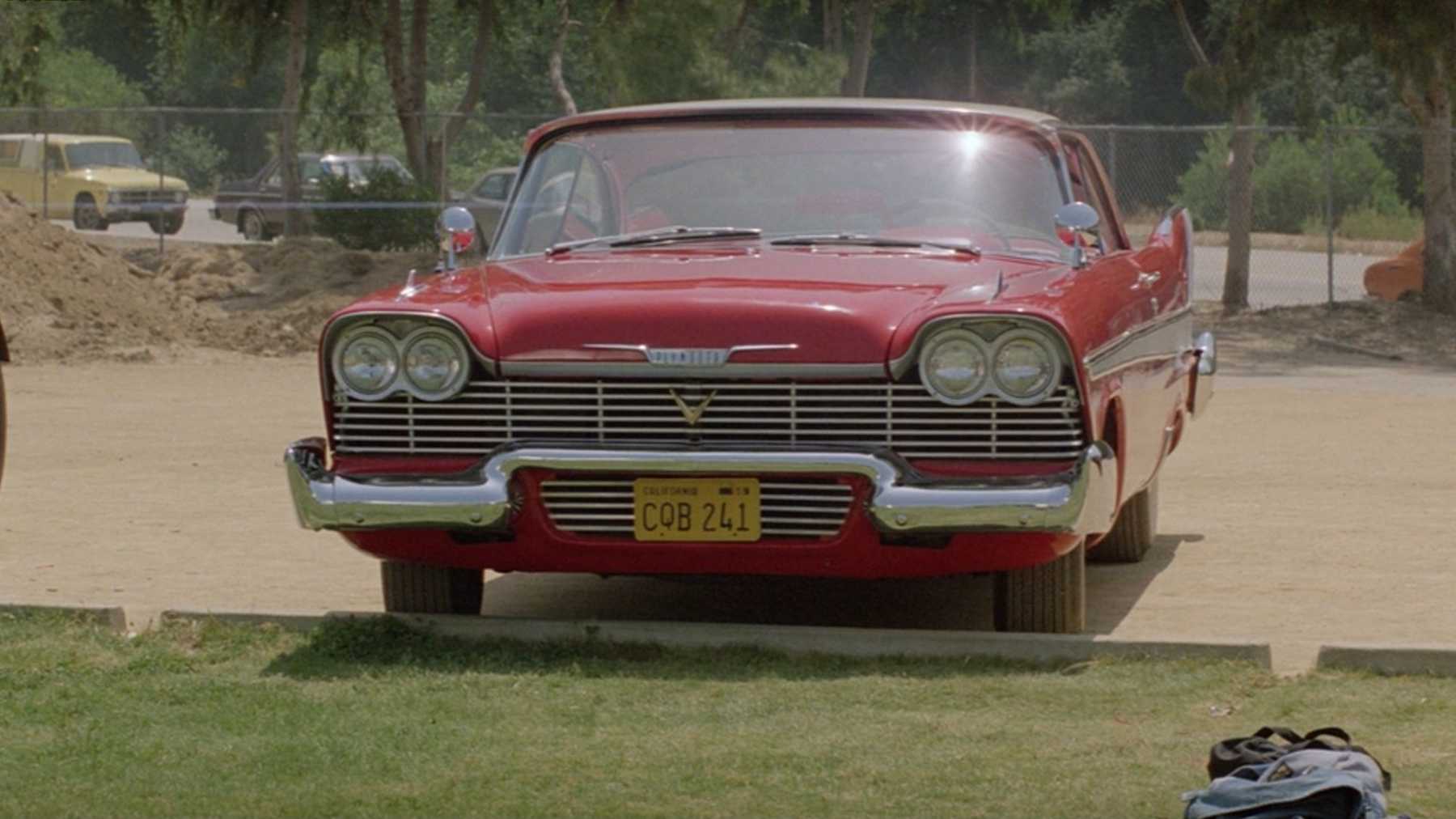Red 1958 Plymouth Fury