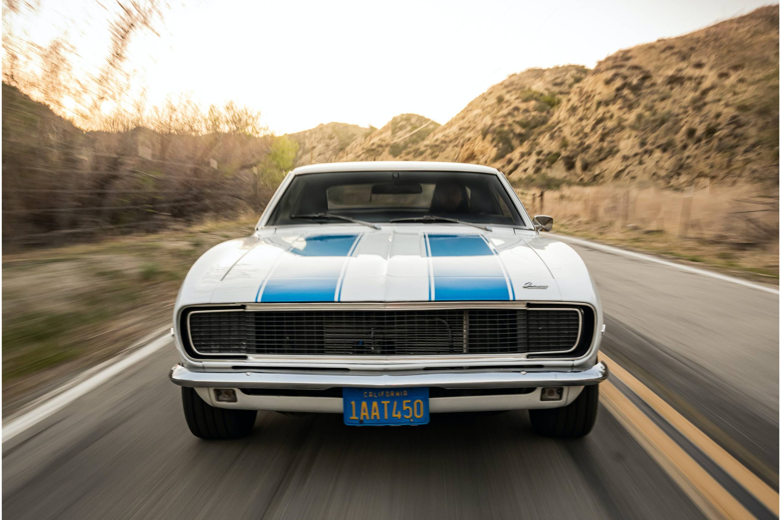 Classic vehicle on road in the desert