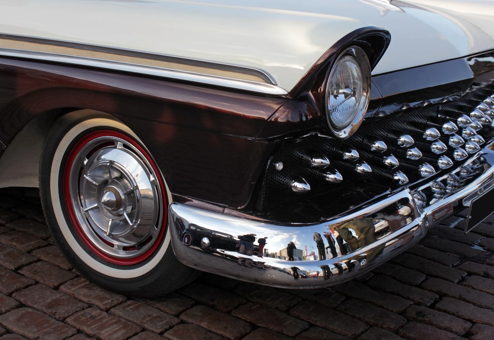 Two tone classic car with silver rims