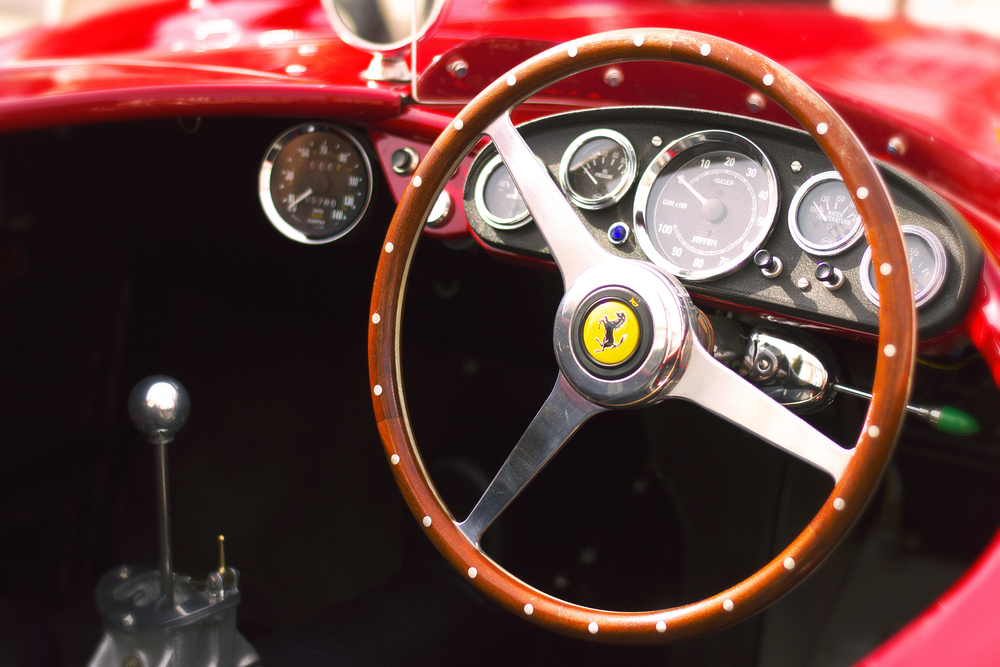 Classic Ferrari steering wheel with original parts and stick shift