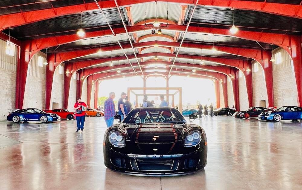 Black exotic Porsche in garage