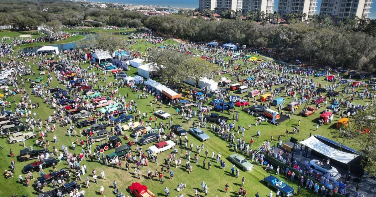 An arial view of The Amelia Concours d'Elegance and Woodside Credit Collector Car Financing booth on Amelia Island, FL.