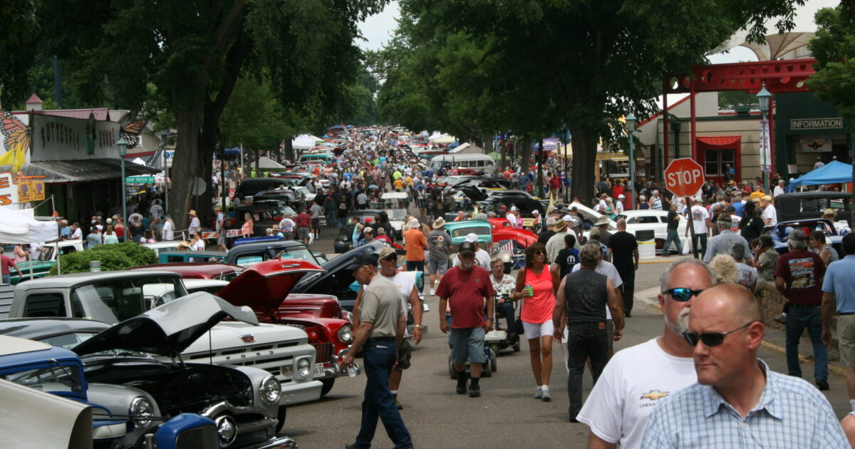 Spectators at MSRA Back to the 50s looking at a Chevrolet Parkwood